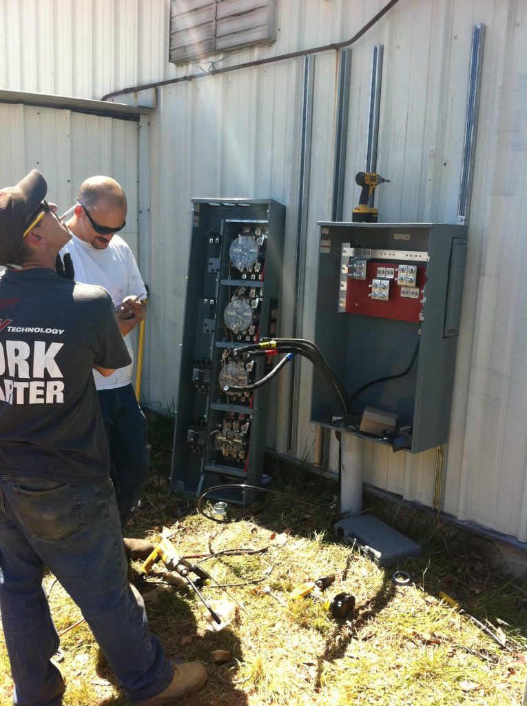 Logan upgrading electrical service at an office