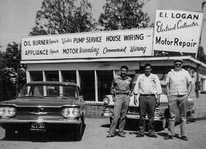 E.I. Logan in front of his original building in the city of Fredericksburg