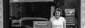 Mrs. Logan in front of the Fredericksburg Office