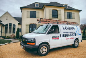 Logan Electric Van parked in front of home
