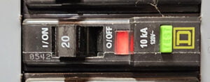 Tripped breaker causing an outlet to be without power